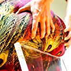 Third pic of Busty brunette Kelly Divine spreading butt cheeks and showing holes filled with toys