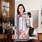 First pic of Sharlyn strips naked on her leather couch - PussyFur.com