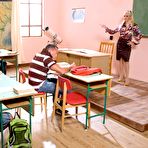 First pic of Brown-eyed blonde slut Lea Lexus takes four cocks at once in the classroom