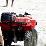 Fourth pic of Alexandra Daddario cleavage in red swimsuit