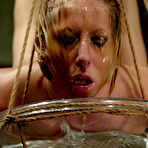 First pic of Crystal Frost takes strapon from mistress after suspension and water bondage