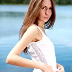 First pic of Nasty girl Angelic Anya is posing outdoor in nothing but tan stockings and garter-belt