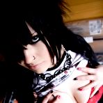 Fourth pic of Raven haired alt lady Chaos Kittie shows her heavy natural tits and tattoos