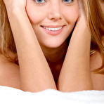 Third pic of Mango A in a White Bodysuit