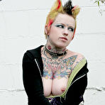Third pic of Rachel Face strips outdoors to prove that she has tattoos from top to toe