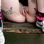 Fourth pic of Rachel Face strips outdoors to prove that she has tattoos from top to toe