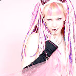 Fourth pic of Alternative blonde Chaotica with pink and white hair shows her pierced nipple and bald pussy