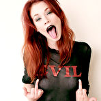 Third pic of Bare foot flexible redhead Justine Joli licks her toes and exposes her pink pussy