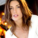First pic of Beautiful brunette August Ames strips and poses on the floor - porn pics at My Pornstar Book