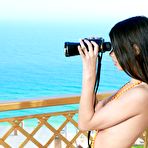 Fourth pic of Naked brunette teen Flora C is erotically eating strawberries in front of the camera
