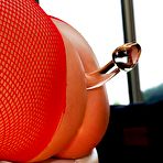 Second pic of Sassy busty blonde Angel Vain is in the sexy outfit showing off body and playing with sex stuff