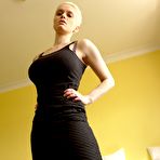 First pic of Busty short-haired blonde Mila Milan treats to hot pussy spreads parting legs in black lacy holdups