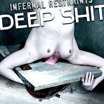 First pic of SexPreviews - Kel Bowie is bound in wooden stock her ass spanked red and tits clamped