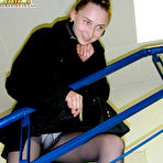 Third pic of Sexy coed in black stockings exposing her panties, tight ass and boobs in public (preview pictures)