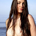 Fourth pic of Big-titted teen posing on the wild beach