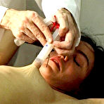 Second pic of Brunette Katharina gets her pussy spread and then fisted by aged gynecologist