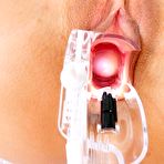 Third pic of Slutty Lily Ocean spreads and takes both dildo and cock into the oozing pussy