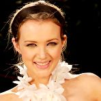 Second pic of The shameless brunette Faye X stripping in the yard and making the closeups of shaved pussy