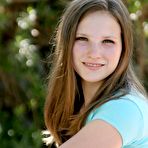 First pic of Youthful smoothie Jules Nubiles with cute smile feels no shame while getting nude in the backyard