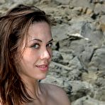 Third pic of Brunette babe Rich A is outdoor seductively rubbing the hottest naked body