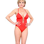 First pic of Busty mom Lady Sonia removes her tight red teddy and gives a close-up of her shaved twat