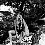 Third pic of Doutzen Kroes posing sexy and without bra