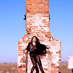 First pic of Naked titted brunette Kayla Jane Danger is posing in black pantyhose outdoor