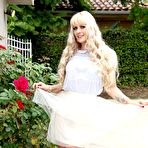 First pic of Huge titted blonde milf Holly Heart is turning here and there and teasing man for hard fuck