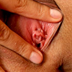 Fourth pic of Euro babe Sabrina Sweet spreads her tight bald pussy and fills her hole with two fingers