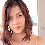 First pic of Cassie FTV strips down to her underwear outdoors then poses naked indoors