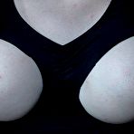 Second pic of SexPreviews - Luna LaVey bound in metal with tits exposed and pussy toyed in dungeon