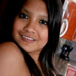 Second pic of Kat Young :: Asian teen Kat Young stripping on table and showing pussy