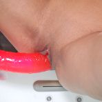 Third pic of Horny blonde teen gets jiggy in the jacuzzi... at Young Ass Pics