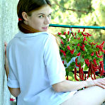 Third pic of Curvy adolescent Melissa is posing in her glamorous schoolgirl uniform at Young Pussy Pics