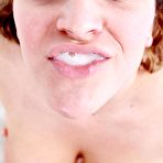 Second pic of Naughty female April Knight is playing with her big boobs and looks happy with cum on lips