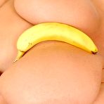 Second pic of Busty milf blonde Laura Orsolya is exposing her luscious body as she tidies up her place