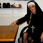 First pic of Shaved pussy nun Krystal Niles takes off her uniform and lingerie after cock domination