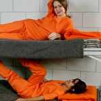 First pic of Lesbian Natasha Nice spreads buttocks of her swarthy cell mate and licks her asshole