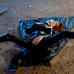 Third pic of Hot Suzie Carina with breathtaking ass wears skin-tight black latex outfit