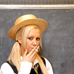 First pic of Naughty schoolgirl in black seamed stockings flashing her curves