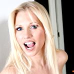 Fourth pic of Nikita enjoys a smoke in mesh negligee