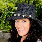 First pic of Brunette Leanne Crow shows off her giant tits outdoors then takes off her skirt and panties