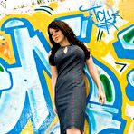 First pic of Bryci in mini dress and high heels exposes her big melons and sexy ass outdoors