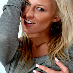 Fourth pic of Blonde chick Kendra Rain takes off her top and performs horny posing in panty