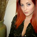 First pic of The redhead teen Lucy Vixen is taking off cloths and recording her own big melons