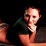 First pic of Stunning softcore honey Freckles takes her shorts off to pose butt naked on her couch.