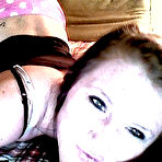 First pic of Being a super hot tease brunette Freckles is wearing pink clothes and sucking on a sex toy