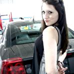 First pic of Naughty brunette Freckles strips down to her red lingerie and sprawls all over that muscle car