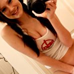 Fourth pic of Naughty brunette Freckless shoots herself while stripping and masturbating