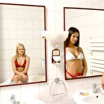 First pic of Brunette Eve Angel and blonde Monica Sweet take off their bikini in the shower